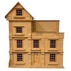 Georgian style wooden four-storey dolls house, part constructed for completion, the double hinged front opening to reveal a central hall and landing, two ground floor rooms, two first floor rooms, second floor room with double doors to roof terrace, and pitched roof hinged for access to attic room, together with some materials and tools including boxed porcelain bathroom suite by Reutter Porzellan, pre-made staircases etc; and quantity of good quality packaged and unused furnishings and accessories by The Dolls House Emporium etc H96cm W84cm D42cm