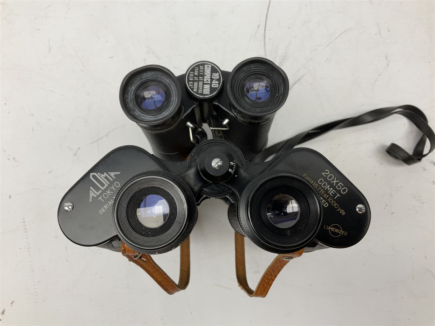 Nine cased pairs of binoculars, to include Embassy 8x40, Tasco 7x35, Zenith 10x50 Field. Opticron 10x50, Swift 8x40 Grand Prix Mk I, etc