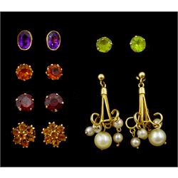 Six pairs of 9ct gold stud earrings including pearl, amethyst, citrine, garnet and peridot