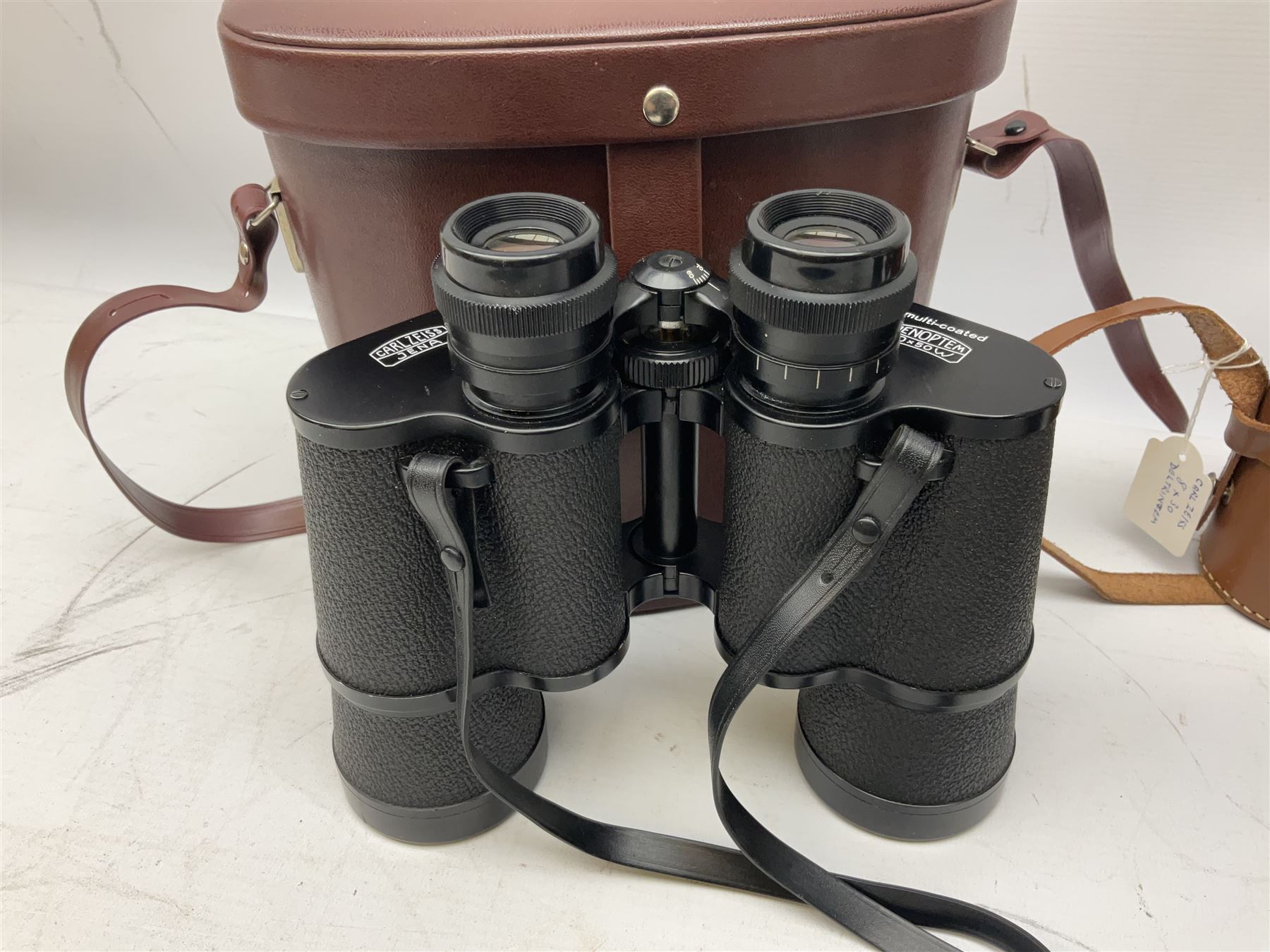 Three pairs of Carl Zeiss Jena binoculars, Jenoptem 10x50W, Jenoptem 8x30W and Deltrintem 8x30W, all cased (3)
