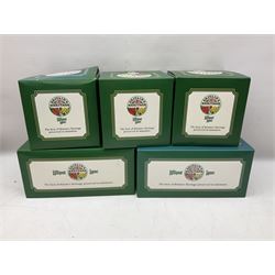 Five Lilliput Lane models from the 'Britain's Heritage' collection, comprising The Royal Albert Hall, Windsor Castle Round Tower, Eros and Nelson's Column and another snowed, all boxed