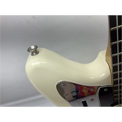 Mexican Fender Jaguar electric guitar with Humbucker pick-ups and tremolo arm, serial no.MX16741977, L101cm; in soft carrying case