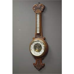  Early 20th century oak cased aneroid barometer with visible mechanism, enamel ceramic dial, mercury thermometer, 'J. Wetherell, Stockton on Tees', H86cm  