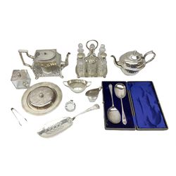 Group of silver plate, to include early 20th century William Briggs teapot, of square form with canted upper edges, engraved with vacant cartouche and foliate surround, Kings Husk pattern fish slice, cruet stand with six bottles, muffin dish and cover, tea wares, etc., in one box 