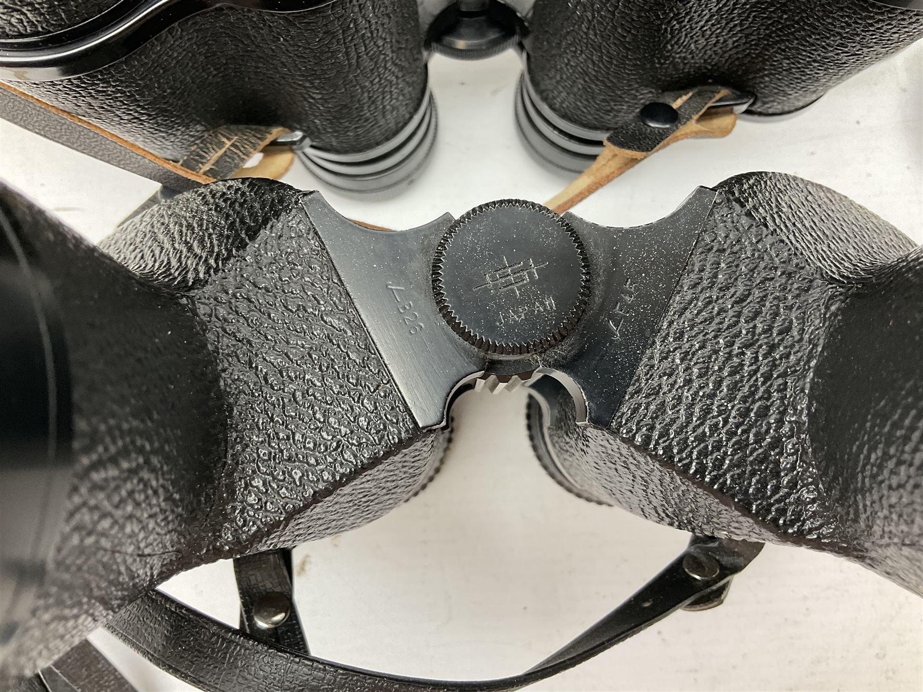 Nine cased pairs of binoculars, to include Tohyoh 22x70, Greenkat 7x- 12x50, Chinon, Fisher-Dietz 7x50, etc