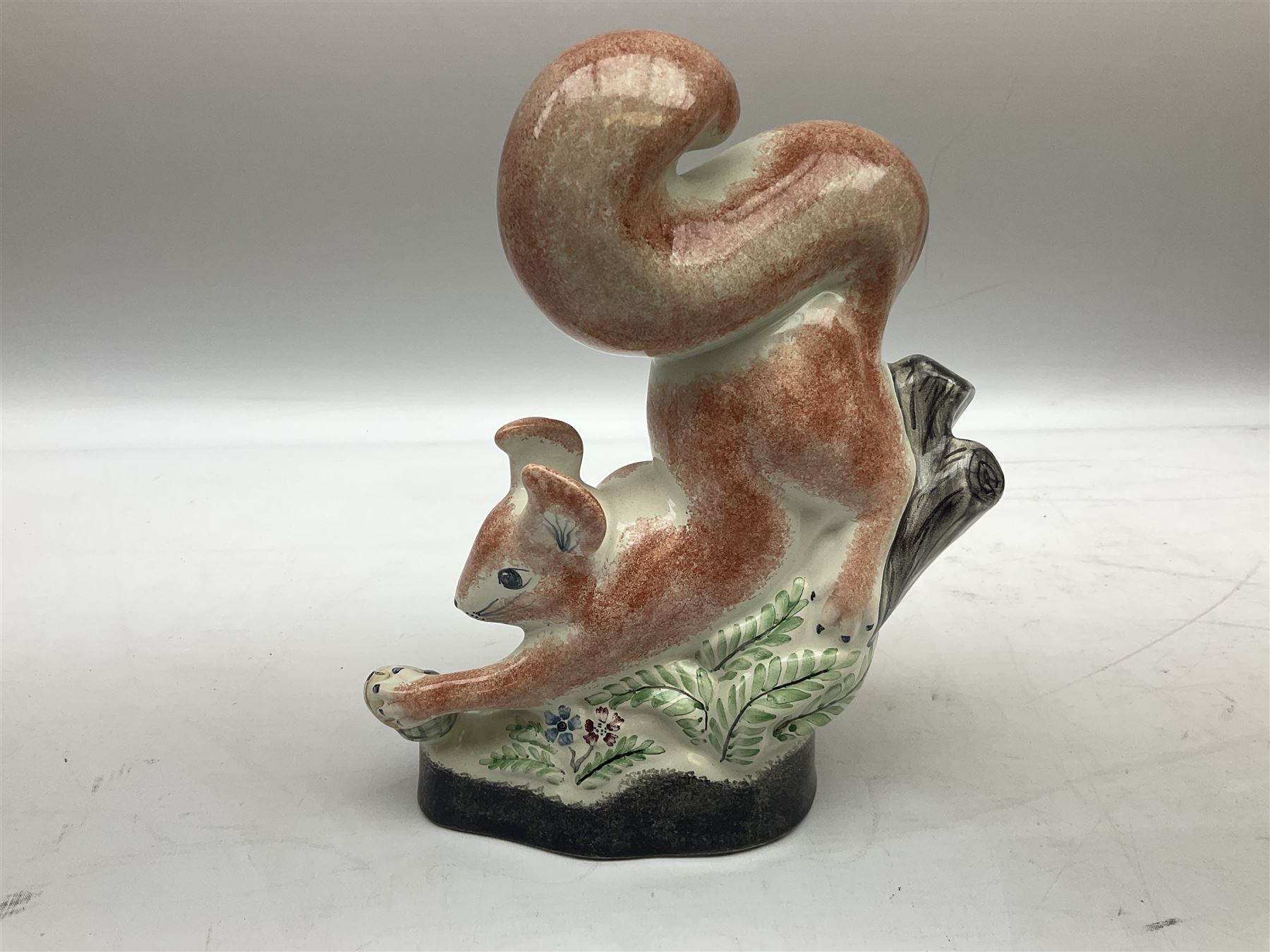 Six Rye Pottery figures, comprising, jumping fox, squirrel upon a branch, billy goat, bull, chicken and cockerel  
