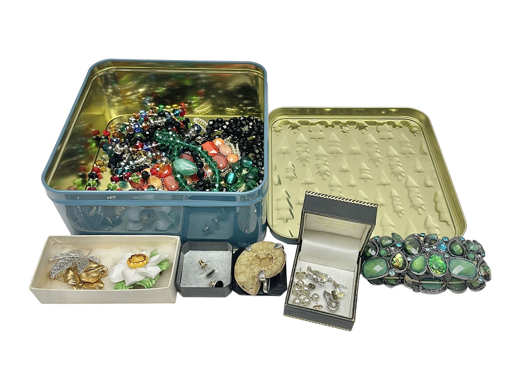 Silver ammonite pendant, silver earrings and a collection of beaded and other costume jewellery