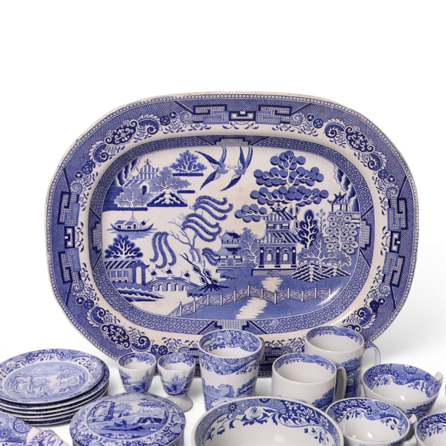 Collection of Spode Italian pattern, including two mugs, six cups and saucers, covered trinket dish, two egg cups etc, together with Willow pattern serving platter