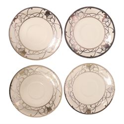 Jacob Hertel Bavarian tea service, decorated with silvered overlay of birds in foliage, comprising teapot, milk jug, covered sucrier three cups and saucers 