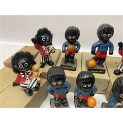 Collection of twenty two Robertson golly figures, H8cm