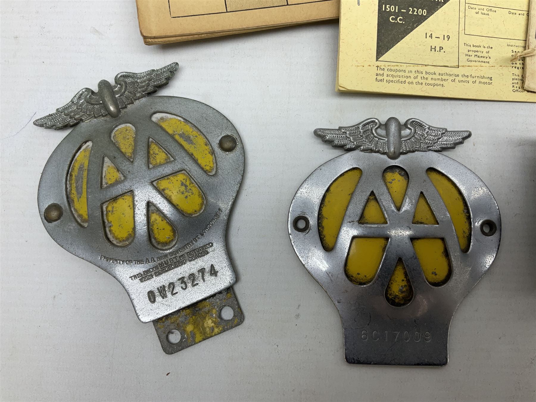 Gold plated leaping Jaguar car mascot, no.7'24265'3WB L12.5cm; three AA car badges and Veteran Motorists car badge; and quantity of 1950s fuel and general ration books
