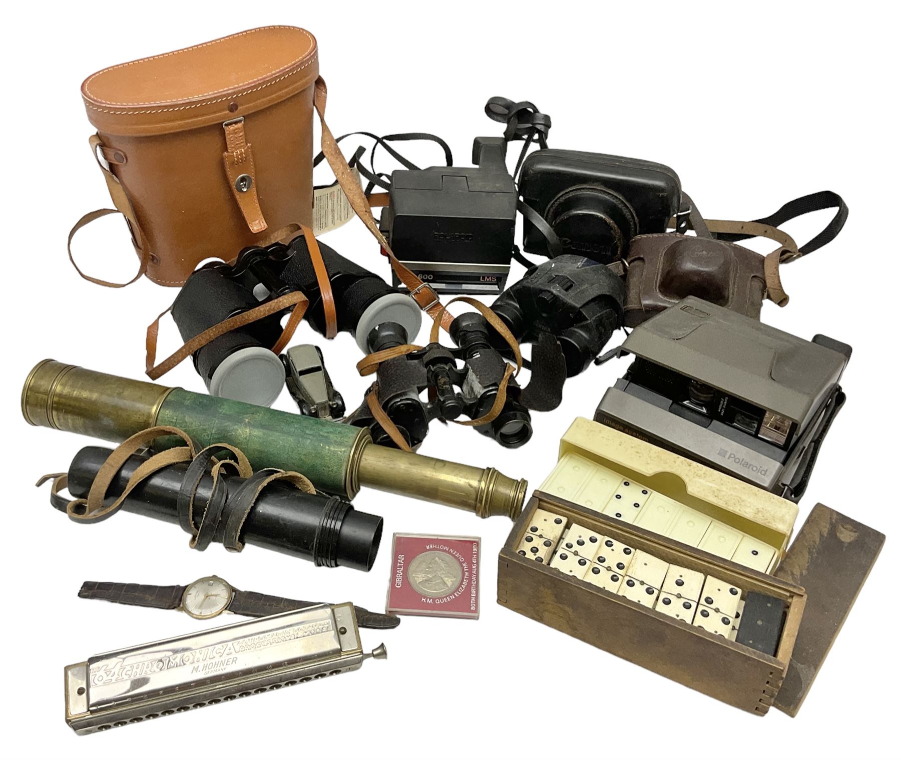 Brass telescope, together with Zenith 7 x 50 field binoculars, two polaroid cameras and other cameras and equipment 
