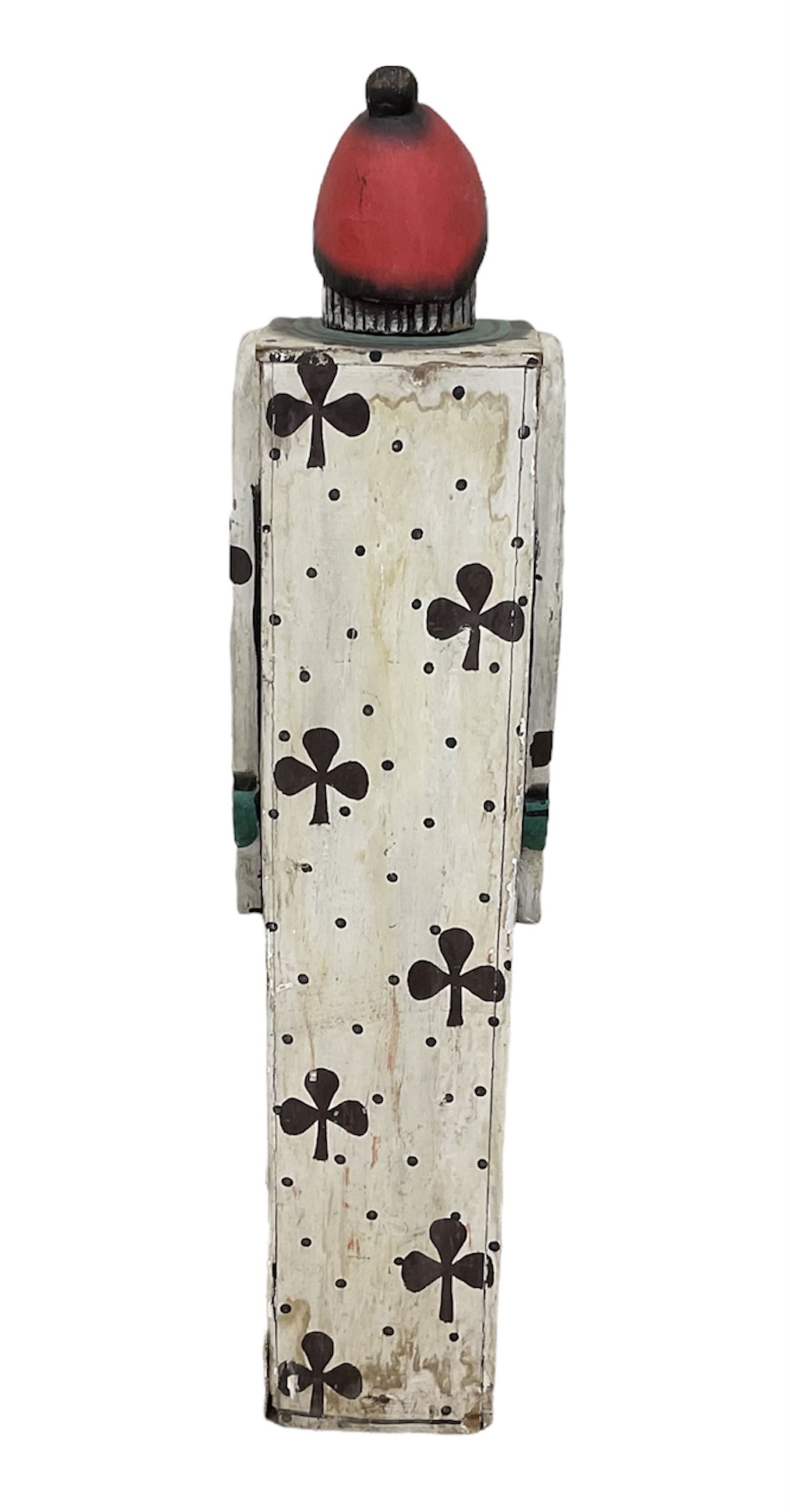 Folk art circus clown cabinet, the the two hinged doors with bow tie decoration opening to reveal fitted shelved interior, the body painted with polka dots and spades, H121cm