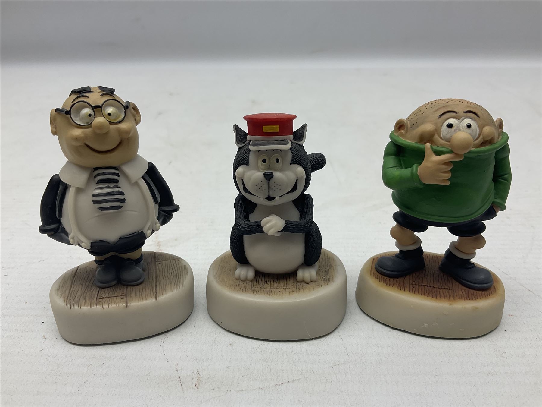 Thirteen Robert Harrop figures from the Beano Dandy collection, comprising Yo-Yo Collectors Piece 1996, Desperate Dan BD03, Cuthbert Cringeworthy BD08, Teach BD06, 'Erbert BD14, Toots BD12, Winston BD17, Fatty BD07, Dennis The Menace BD01, Dennis the Menace Fishing BD806, Sydney BD13, Wilfrid BD15 and Plug BD11