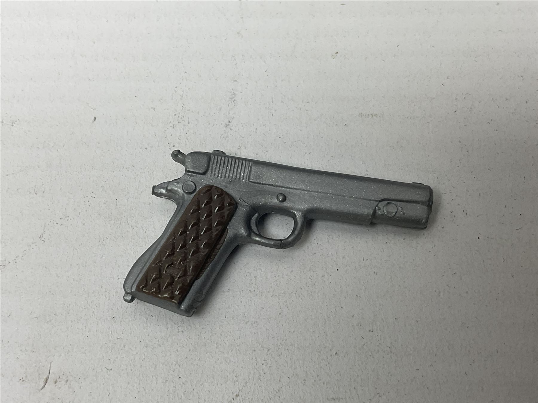 Palitoy Action Man Action Soldier No.34014 with tunic, belt, trousers, boots, blue beret and sten gun; in original box; and Palitoy Action Man Royal Military Policeman (RMP) gripping hands figure, marked 'Made in England by Palitoy under licence from Hasbro © 1964' to rear of torso; with tunic, shirt, trousers, tie, boots, belt, truncheon, pistol in holster, MP armband, red cap, Sterling machine gun and other clothing etc; in anrelated display box (2)