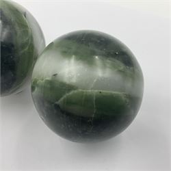 Pair of nephrite jade spheres, D6cm 