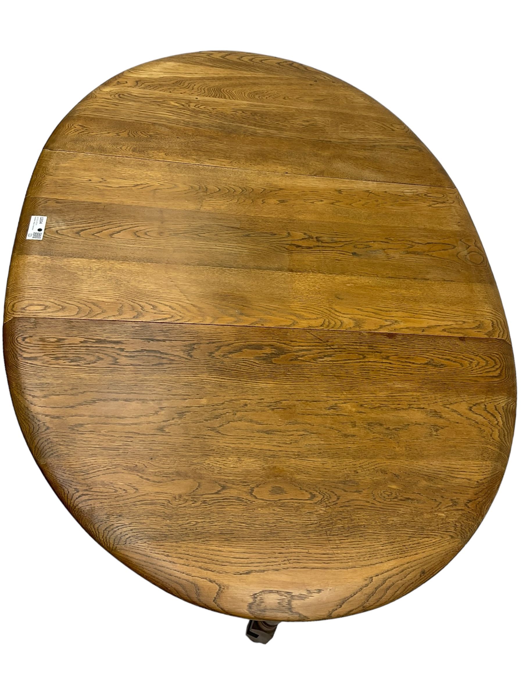 Mid-to-late 20th century oak and beech drop-leaf dining table, gate-leg action base with turned supports