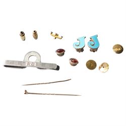 Pair of silver and enamel J clip on earrings, pair of gold cabochon garnet dress studs, si...