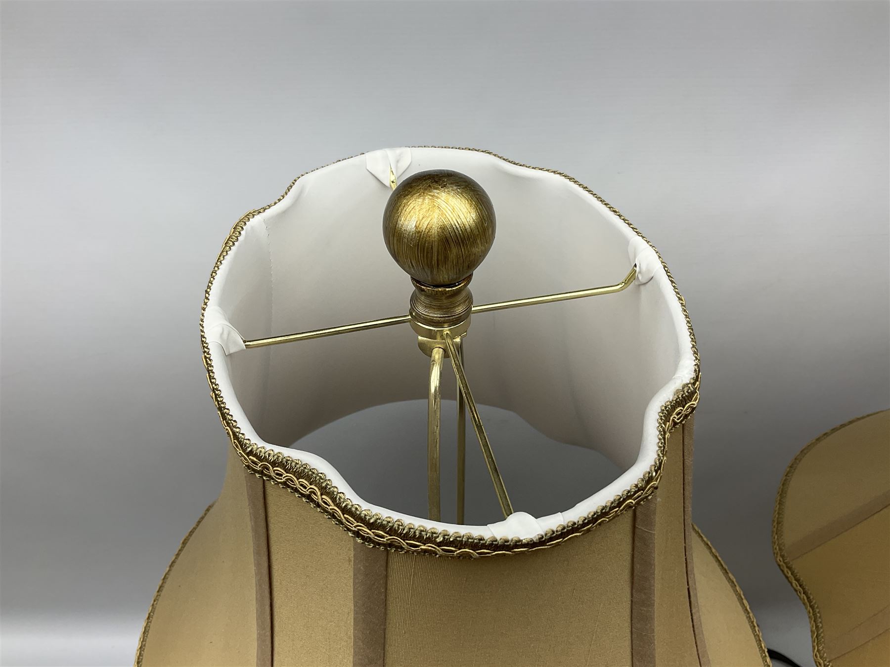 Pair of table lamps decorated with gold crackle effect design, upon stepped bases, with fabric shades, H86cm