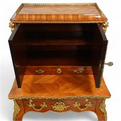 Late 19th century French Louis XV style kingwood and ormolu mounted bonheur du jour, the upper section with a pierced three-quarter gallery over a pair of cupboard doors inset with Sèvres-style porcelain portrait plaques, enclosing a shelved interior over two short drawers, the serpentine top and apron richly mounted with gilt-bronze foliate and scroll motifs, single frieze drawer below on cabriole supports with acanthus cast sabots
