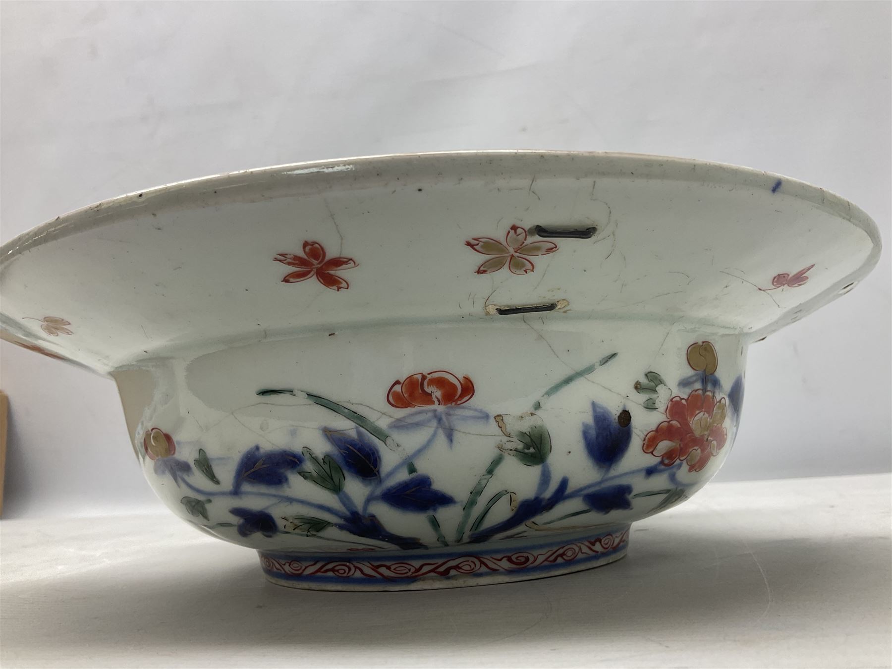 19th Century Imari pattern Japanese blood letting bowl, together with 19th century chinese blue and white square dish with decorated with blossoming flowers, together with thee blue and white saucers 