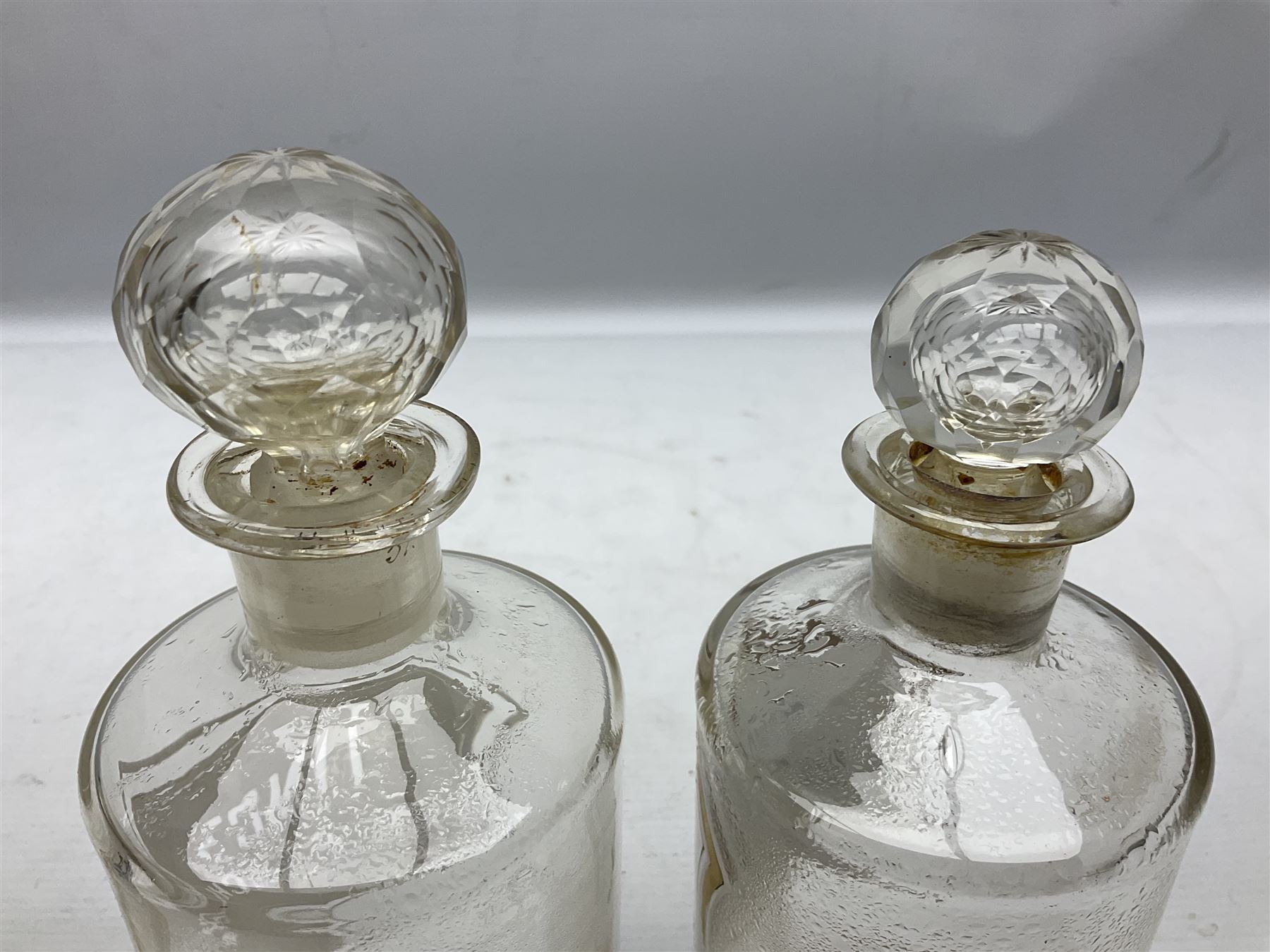 Three Victorian apothecary chemist bottles complete with labels and glass stoppers, H22cm