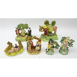  19th century Staffordshire group 'The Jolly Traveller', 'Tithe Pig', Scotsman playing bagpipes with dog at his feet, matching figure of a girl with dog and two other groups (7) Provenance: From a Private Yorkshire Collector  