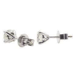 Pair of 18ct white gold round brilliant cut diamond stud earrings, hallmarked, total diamond weight approx 1.00 carat