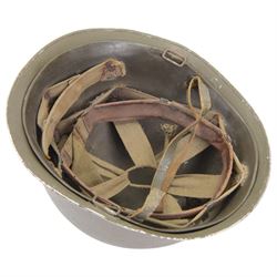 Indochine period, French 1st Legion M47 steel helmet, with 1st legion insignia painted to the front, with inner webbing and leather chin strap 