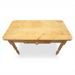 Victorian design stripped pine table, rectangular top with rounded corners, single centre drawer, raised on four turned legs