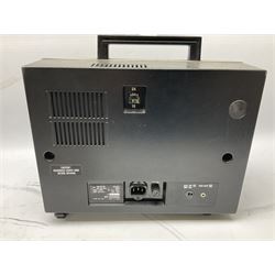 Elmo ST-1200 sound film projector, with instruction manual and black carrying case