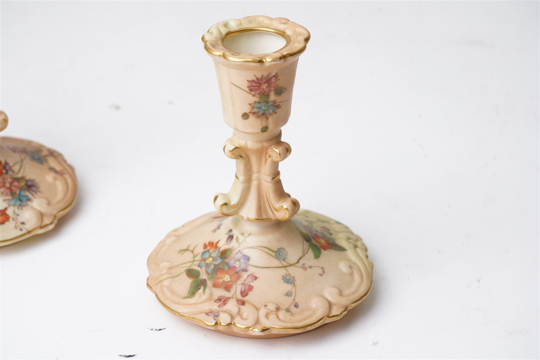 Collection of Worcester blush ivory, including a pot pourri and a pair of candlesticks by George Grainger & Co, with brown and green stamps to bases, together with a teacup and saucer with marks in puce, candlesticks H12cm 