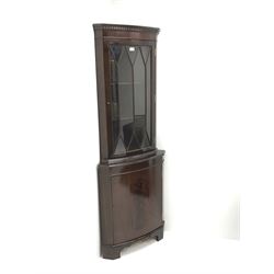 Mid century mahogany corner display cabinet, single door enclosing shelves above single cupboard, W66cm, H182cm, D43cm