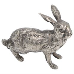 German silver model of a prowling fox, stamped Germany Sterling to underside of tail, together with a Continental silver model of a hair, with London import mark for 1971, tallest H6cm 