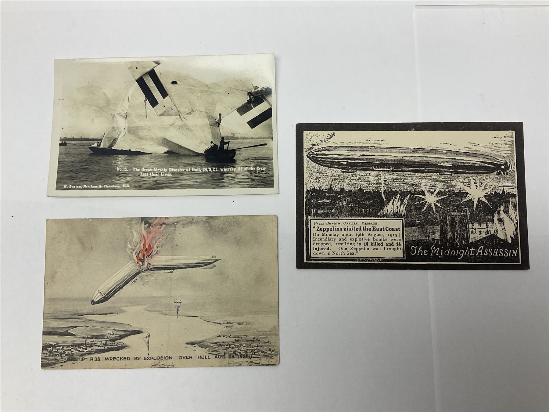 Collection of twenty six postcards depicting Airships/Zeppelins, including two pairs depicting the tragedy of the R.38. wrecked over Hull August 24th 1992, many unused.