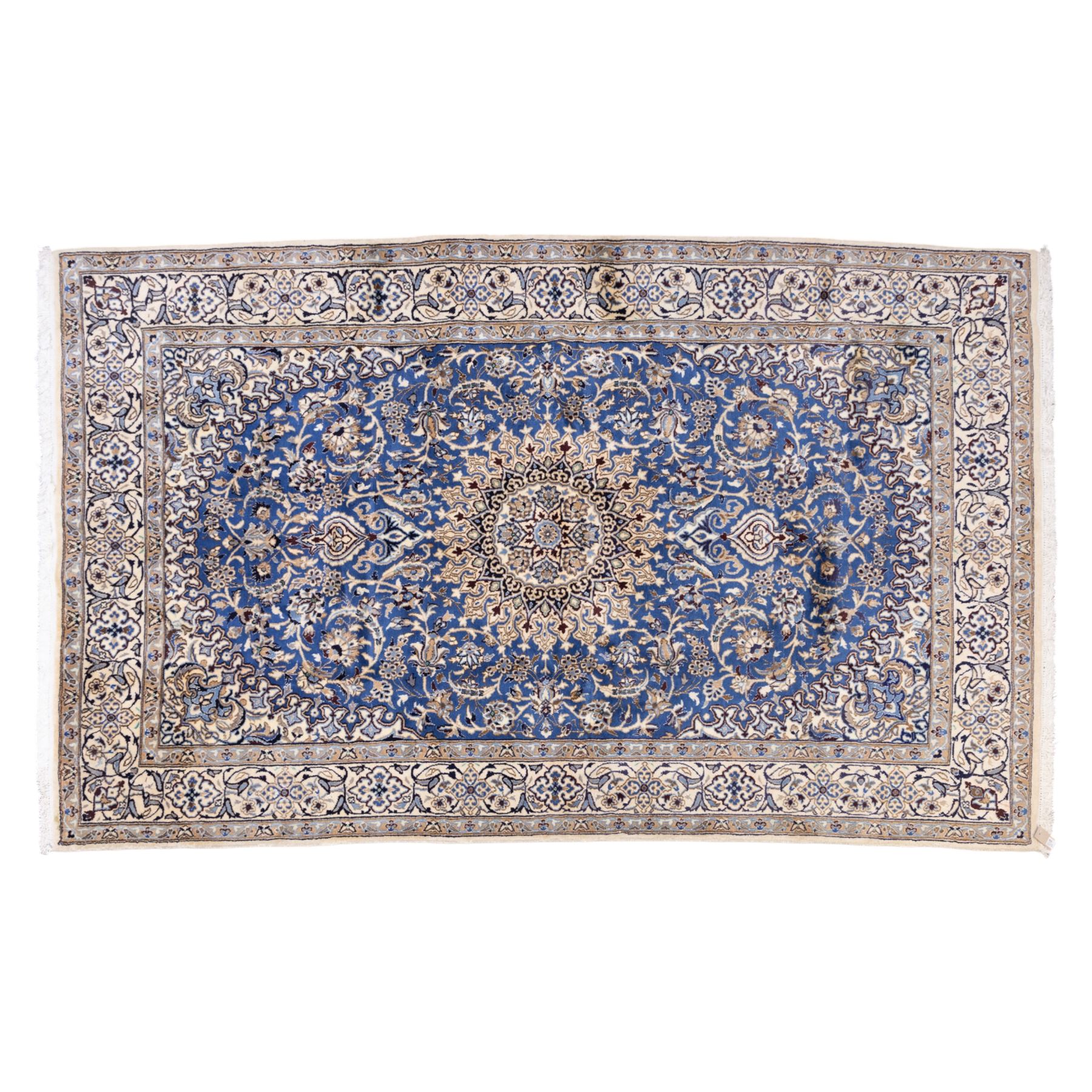 Central Persian Nain hand-knotted rug, soft blue field with central medallion with finely drawn scrolling palmettes and floral tendrils, with ivory spandrels, enclosed by a floral meander border flanked by multiple guard stripes with cotton fringe ends 