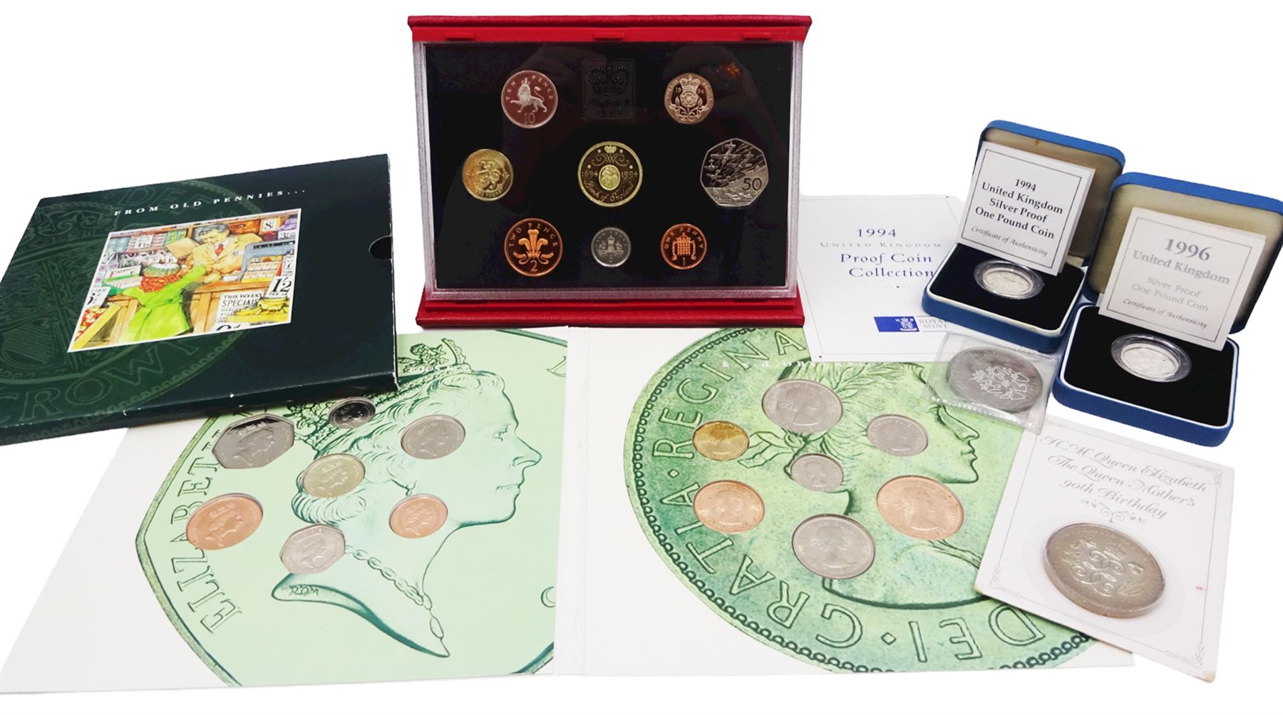 The Royal Mint United Kingdom 1994 proof coin collection, 1994 and 1996 silver proof one pound coins, all cased with certificates, 'From Old Pennies to Decimal Pence' coin set in card folder, etc.