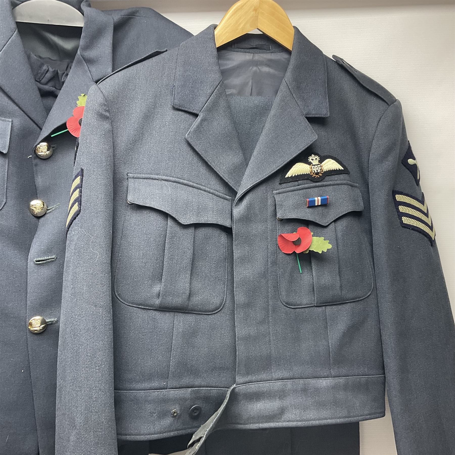 Two post-WWII British Army No.2 Dress tunics, one with Green Howards buttons; army shirt dated 1951; Royal Fleet Auxilliary jacket with trousers; three RAF/WAAF uniforms and RAF Greatcoat; and three canvas/webbing bags, two dated 1943 & 1945