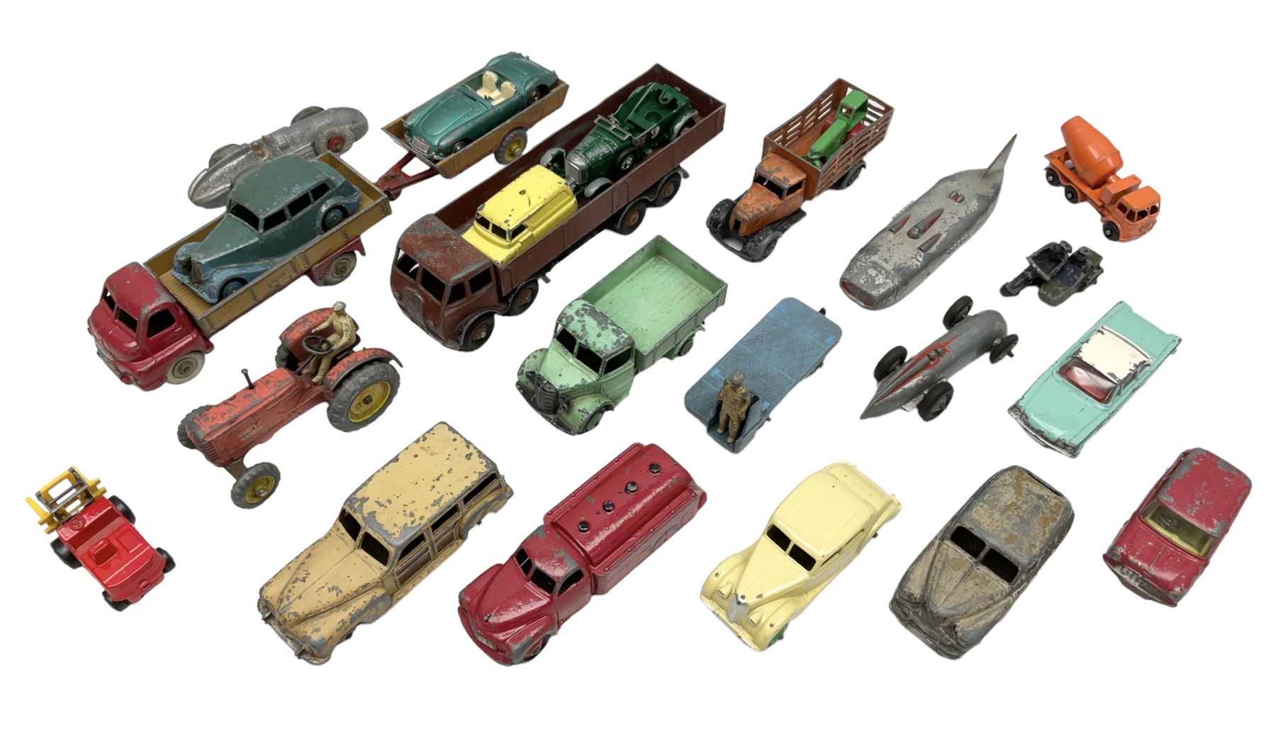 Dinky - sixteen unboxed and playworn die-cast models including Foden lorry, Big Bedford lorry with Halesowen Farm Trailer, Thunderbolt land speed record car, Spirit of the Wind racing car, market garden truck, Bedford tipper, station wagon, tanker, motorcycle combination etc; two Corgi models; and five Matchbox/Lesney models (23)