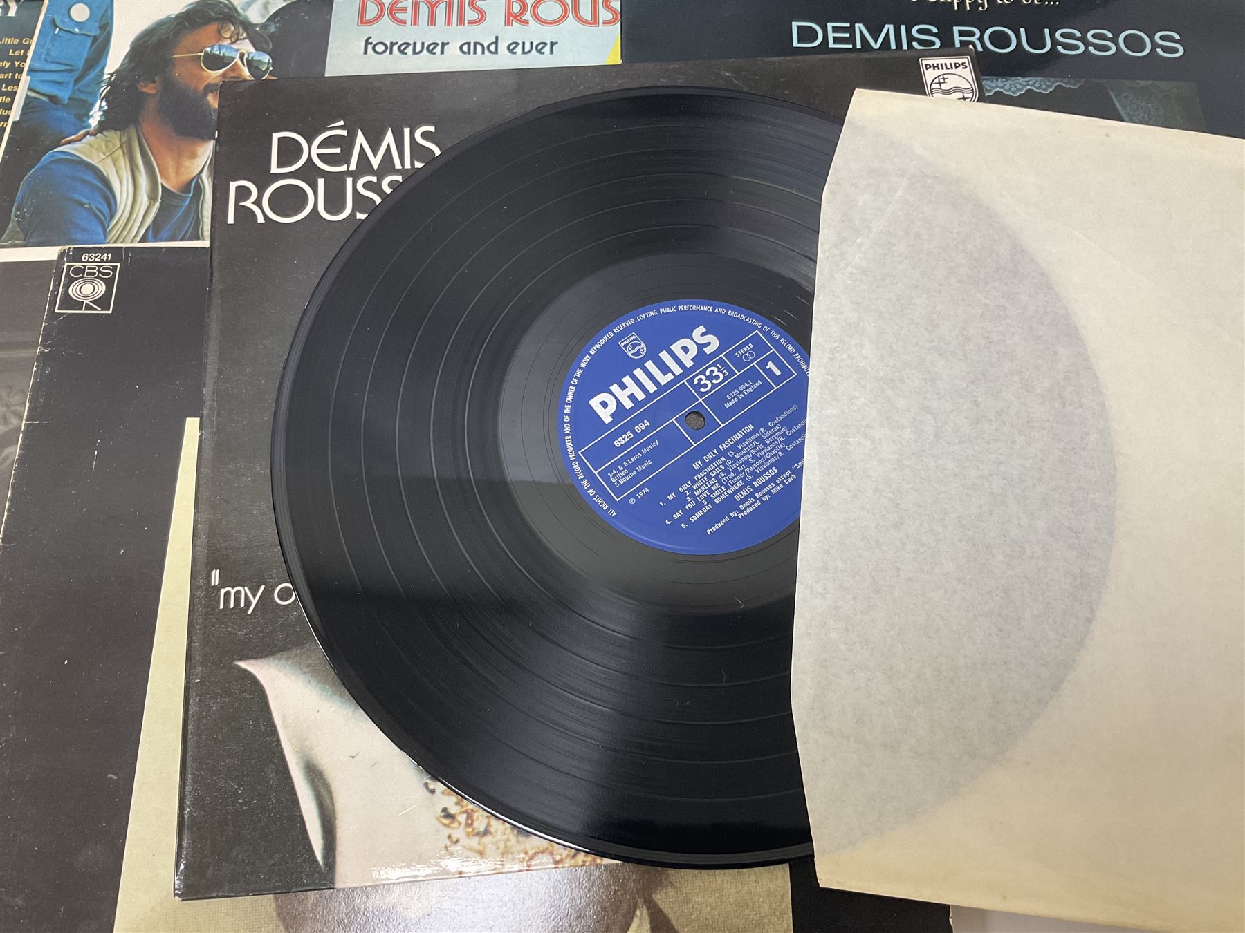 Vinyl LP records including Iron Maiden Killers, Leonard Cohen, Billy Joel, Demis Roussos etc