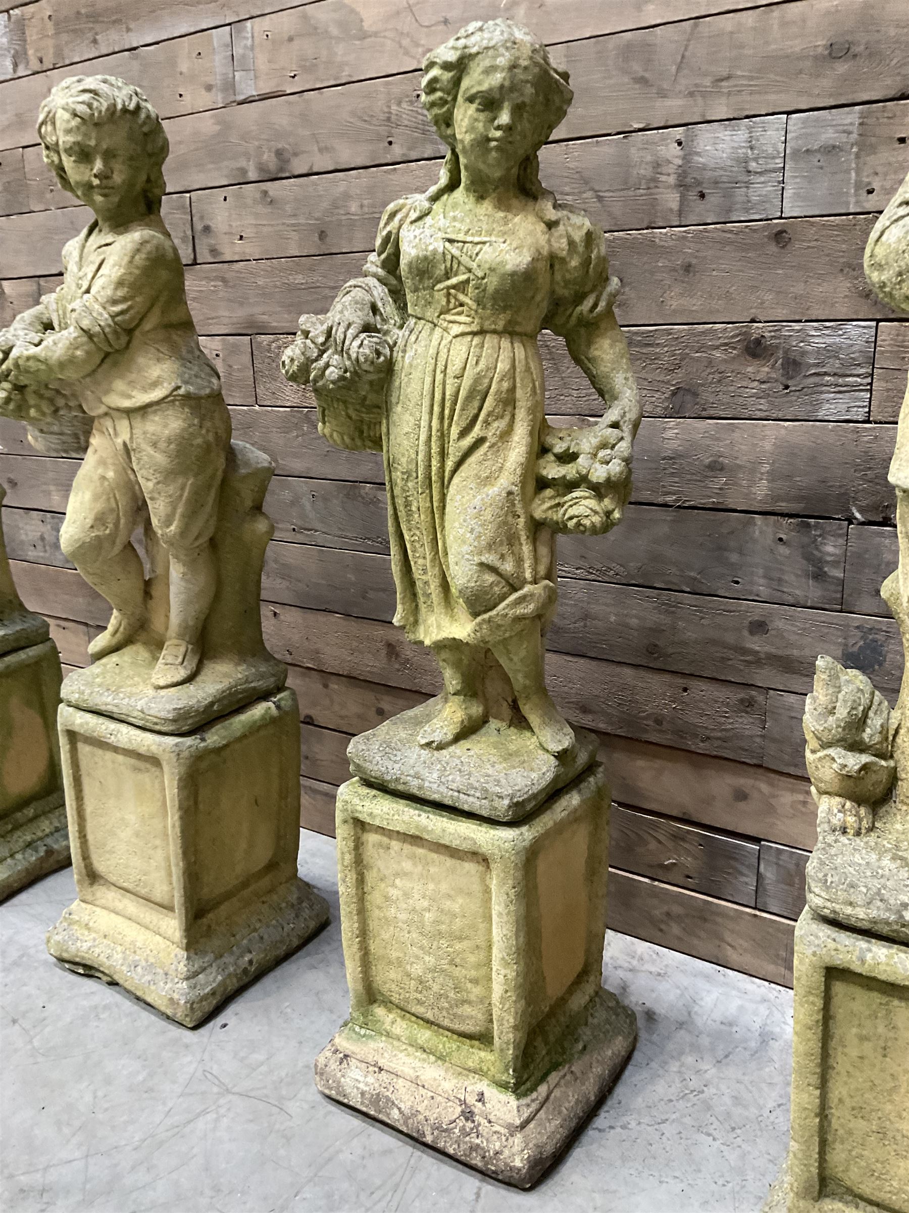 The Four Seasons - set of four cast stone garden figures on plinths