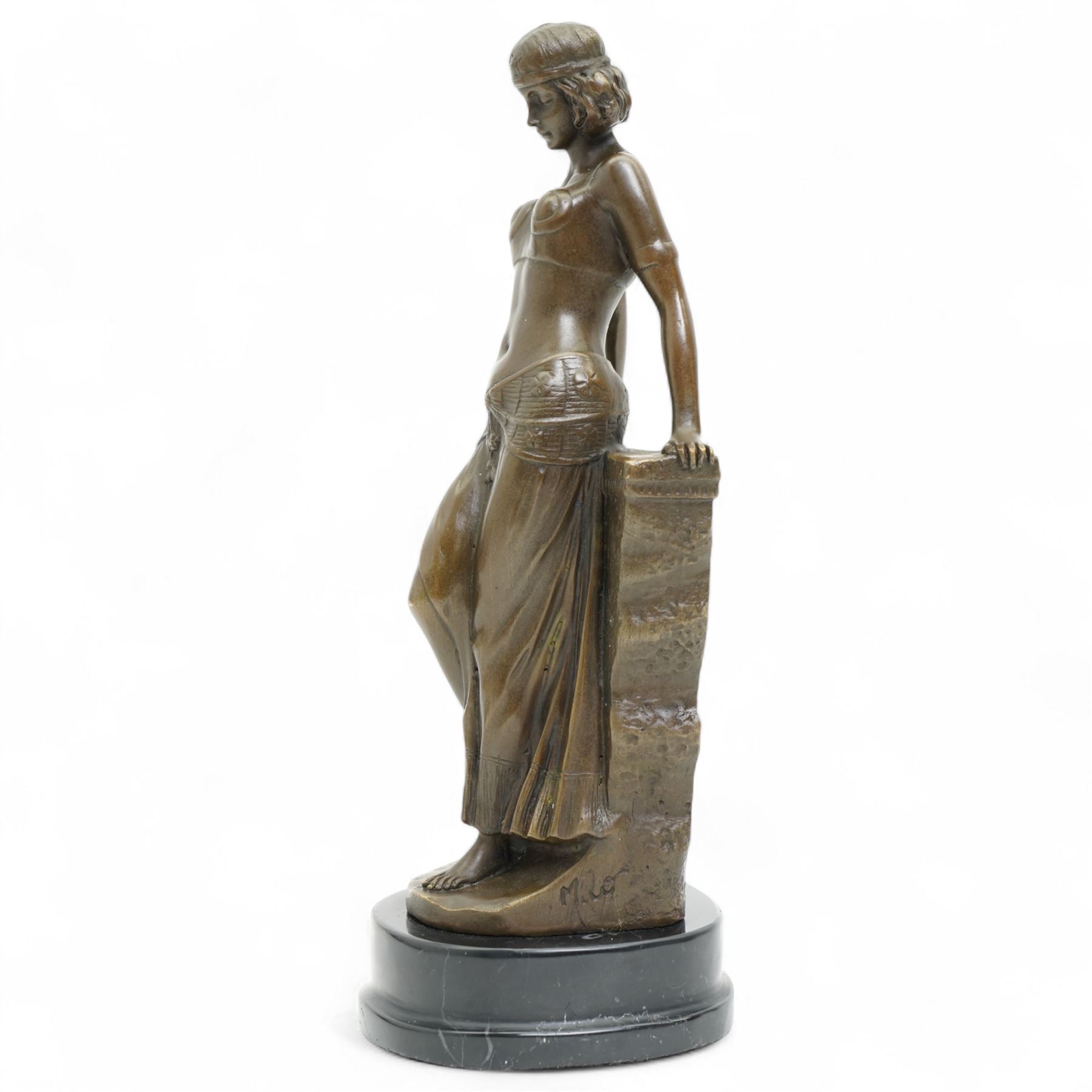 Bronze figure of an Egyptian lady wearing a shendyt, signed Milo and with foundry mark, H25cm 