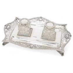 Late Victorian silver desk stand, of rectangular form, with shaped and pierced, oblique ga...