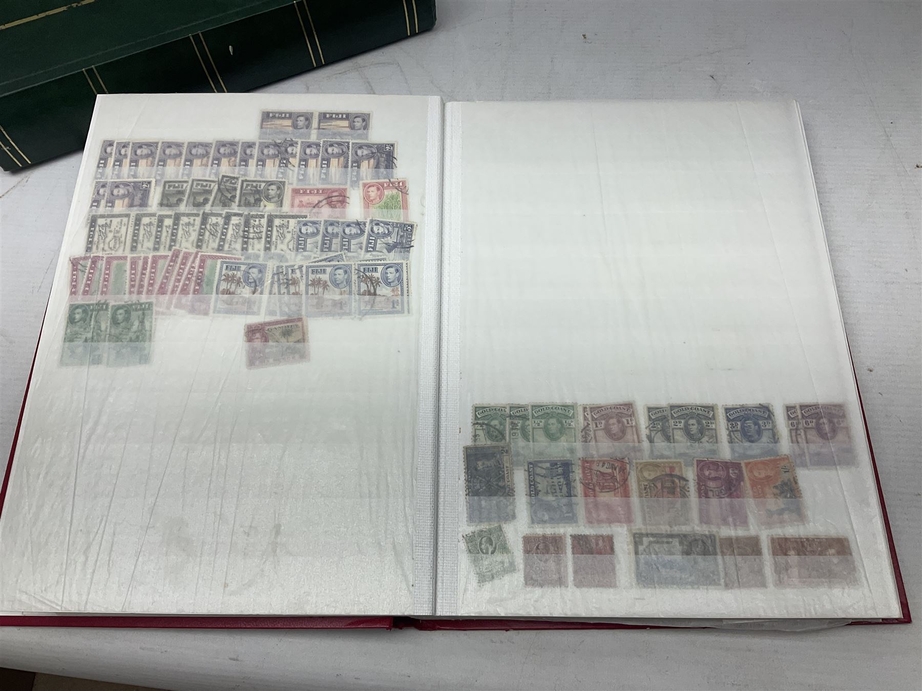 Stamps including Queen Victoria Queensland, modern Australia, King Edward VII Ceylon and Mauritius, South Africa, Gambia, Falkland Islands, Gold Coast, Ireland etc, housed in seven albums/folders and on loose album pages, in one box