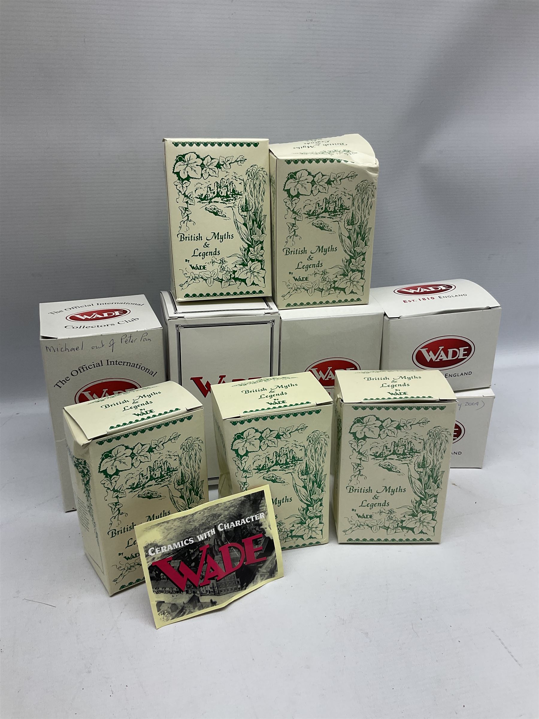 Nine Wade Collectables figures, comprising six Myths and Legends; King Canute, Mermaid, St George, Cornish Tin Mine Pixie, Puck and Green man, together with Lamb, Elephant and bear, a Wade Panda money box and two boxes of Wade Christmas Crackers