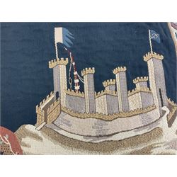 Three tapestries comprising 20th century wool tapestry panel of a medieval nobleman upon a horse with a castle in the distance, together with a smaller tapestry depicting The English Coat of Arms, both hung on rails, and further depicting village scene, largest approx 132cm x 95cm