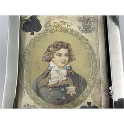 Edwardian silver mounted playing card case, hallmarked William Harrison Walter, Birmingham 1903, the sides each with a period playing card set behind a bevelled glass panel, the hinged cover with later engraving 'Presented to Norman T Crombie Esq by the officers & men of the 31st WR Detachment for services rendered 1917-1918', with red leather lined interior, the three compartments upon a sprung base and containing two later wooden Whist markers, case H12.5cm