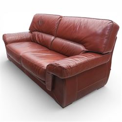 Fabrizio Mantellassi - 20th century Italian red leather suite, one three seat and two large armchairs, upholstered in deep red hide with stitched seam detailing, with magazine pockets to each side, the rectangular back cushions above broad padded arms and seat cushions, raised on low block bases

Sofa: H c98m, W 203cm, D 92cm
Armchair: H 98cm, W 113cm, D 92cm