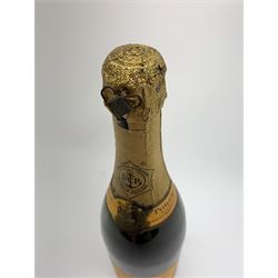 One bottle of Veuve Clicquot Ponsardin 1947 dry champagne, foil seal partially damaged, level below label