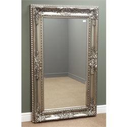  Rectangular bevel edged mirror in silvered swept framed, 93cm x 154cm  